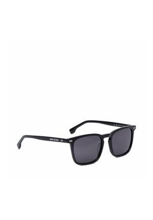 Gafas de sol rectangulares negras con lentes oscuras y varillas delgadas, con la marca "GINO ROSSI" en la varilla lateral.