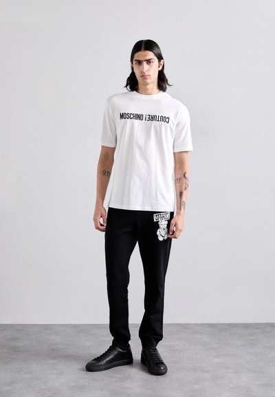 MOSCHINO T-shirt imprimé - fantasia bianco