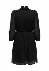 Robe courte noire transparente texturée avec manches longues bouffantes, col haut à volants et taille cintrée, vue de dos sur fond blanc.