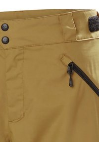 Khaki broeken met twee zwarte knoopsluitingen, een ritszak en een gestructureerde tailleband. Bevat stikseldetails en een zijzak.