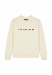 Felpa beige chiaro realizzata in morbido tessuto, con la scritta "HO PARLATO DI TE A CHATGPT" in grassetto nero sul davanti.