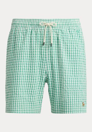 Zeleno-biele kockované plavky s elastickým pásom, bielym šnúrkou a malým vyšitým logom koňa na ľavej nohe.