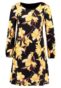 Vestido negro de mangas largas, con un patrón floral amarillo y puños elásticos. Confeccionado en tela ligera y con un cuello redondo.