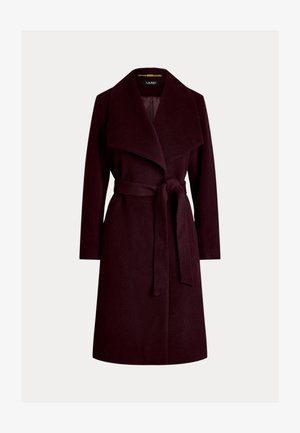 Tmavofialový vlnený kabát dĺžky po kolená so širokými klopami a viazaným opaskom v páse, zobrazený na jednofarebnom pozadí.