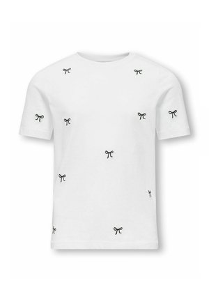 T-shirt bianca a maniche corte con piccoli disegni di fiocchi neri ricamati sparsi sul davanti e sulle maniche.