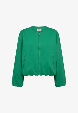 Groene jas met rits, ronde hals, lange mouwen en zijzakken. Gemaakt van gladde stof met een losse pasvorm en elastische tailleband.