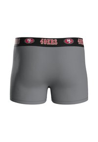 Harmaat boxerit mustalla vyötärönauhalla, jossa lukee "49ERS" ja on logo. Sileä pinta ja istuva malli.