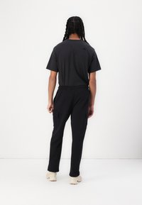 The North Face Pantalones deportivos - black