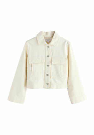 Kreemikas kärbitud jakk kraega, ees nööpidega, kahe klapiga tasku ja pikkade varrukatega.