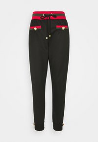Svarta joggers med en röd och grön randig midja, guldbuttondetaljer på fickor och mudd, med dragsko för justerbar passform.