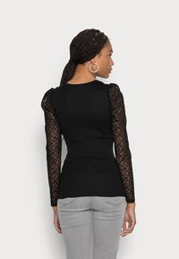Rosemunde Camisola de manga comprida - black