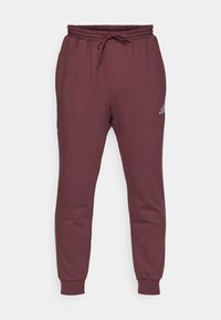 FEELCOZY - Pantalones deportivos - aurora ruby/white