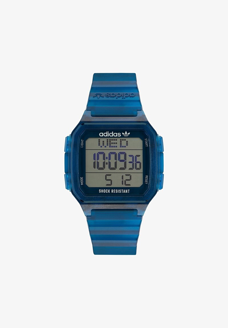 Digital wristwatch with a blue translucent strap and case. Features a rectangular LCD display, showing time and day. Shock resistant design.