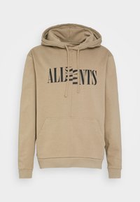 Bluza z kapturem w kolorze beżowym wykonana z bawełny, z przednią kieszenią, czarnym napisem "ALLNTS" oraz sznurkiem przy szyi. Gładka tekstura i casualowy design.
