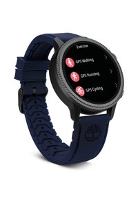 Zwarte smartwatch met een ronde wijzerplaat en touchscreen. Marineblauwe siliconen band met textuurontwerp. Het scherm toont oefenopties: GPS Wandelen, Hardlopen, Fietsen.