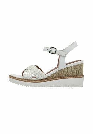 Sandali wedge bianchi in pelle con cinturini intrecciati, cinturino alla caviglia regolabile e dettaglio in wedge beige testurizzato. Design elegante e moderno.