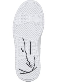 White sneaker sole with textured rubber, featuring zigzag pattern, three-grip sections, and a black logo detail. Rounded heel.