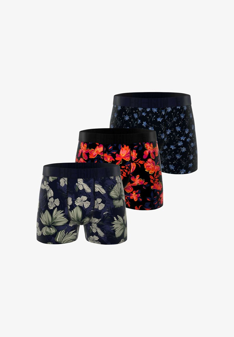 Ensemble de trois boxers pour hommes avec des motifs floraux. Les couleurs incluent le bleu marine, le noir et le rouge avec des ceintures élastiques noires.