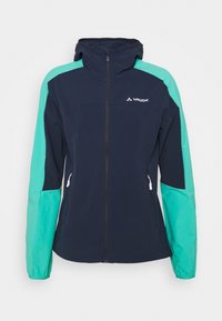 Veste softshell bleu marine et teal avec capuche, dotée de poches zippées et de panneaux de manches contrastés. Légère, avec une coupe élégante.