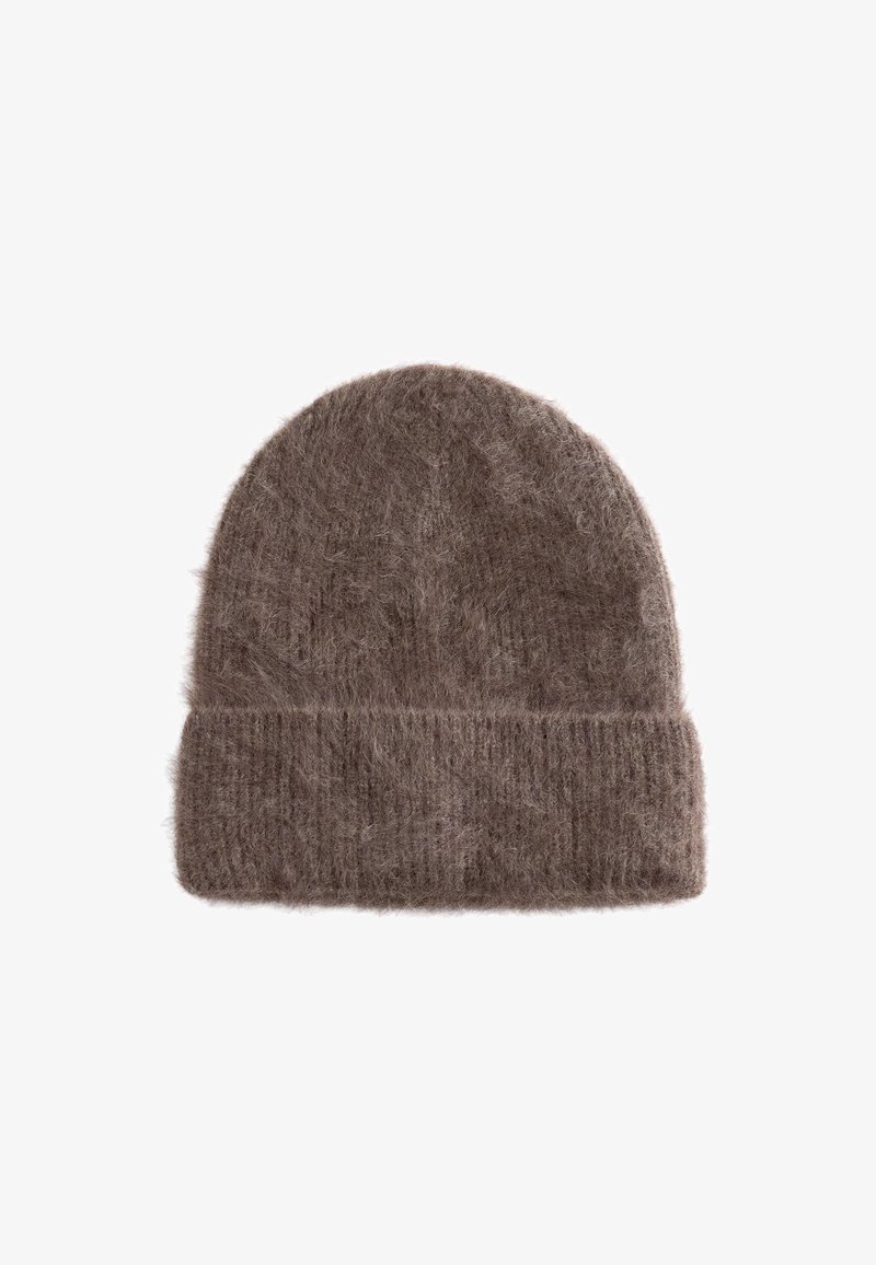 Brown knitted beanie with a soft, fuzzy texture. Folded cuff at the bottom and a rounded top. Made from a blend of warm materials.