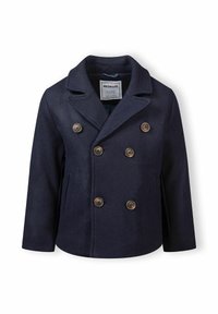 Tumed sinine kahe nööbiga mantel, mis on valmistatud pehmest kangast, sisaldab messingist nuppe, soonikläbipäiseid ja küljetaskuid.