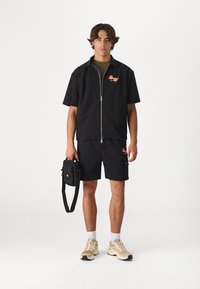 Don't Waste Culture BRYN UNISEX - Pluus - black