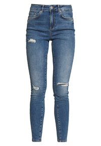 Džínové skinny jeans s vysokým pasem v modré barvě, s dírami na kolenou, vybledlou texturou a tradičním pětipocket designem.