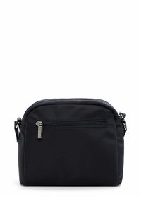 Black nylon crossbody bag with a rounded shape, top zipper closure, and a front zip pocket. Features silver hardware accents.