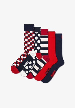 Set of five socks featuring various patterns: geometric red and navy, white polka dots, navy and white stripes, solid red and navy.