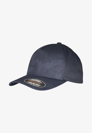 Casquette bleu marine en tissu texturé, avec une visière incurvée et une étiquette Flexfit à l'avant. Sa forme est structurée avec un design sans couture.