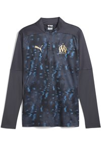 Puma sportieve lange mouwen shirt, marineblauw met een textuurpatroon en lichterblauwe accenten, voorzien van een halve rits kraag en gouden logo details.