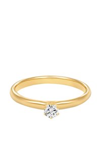 Anello in oro con una finitura liscia e lucida, caratterizzato da un unico diamante tondo incastonato in una montatura a forma di fiore.