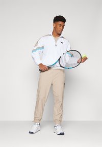 Diadora TRACK PANTS ICON - Jogginghose - humus