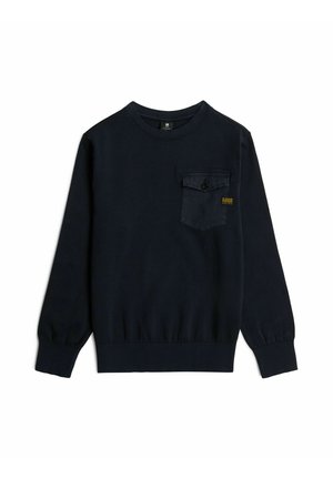 Black long-sleeve crew neck sweatshirt with ribbed cuffs and hem, featuring a buttoned chest pocket with a small yellow label.