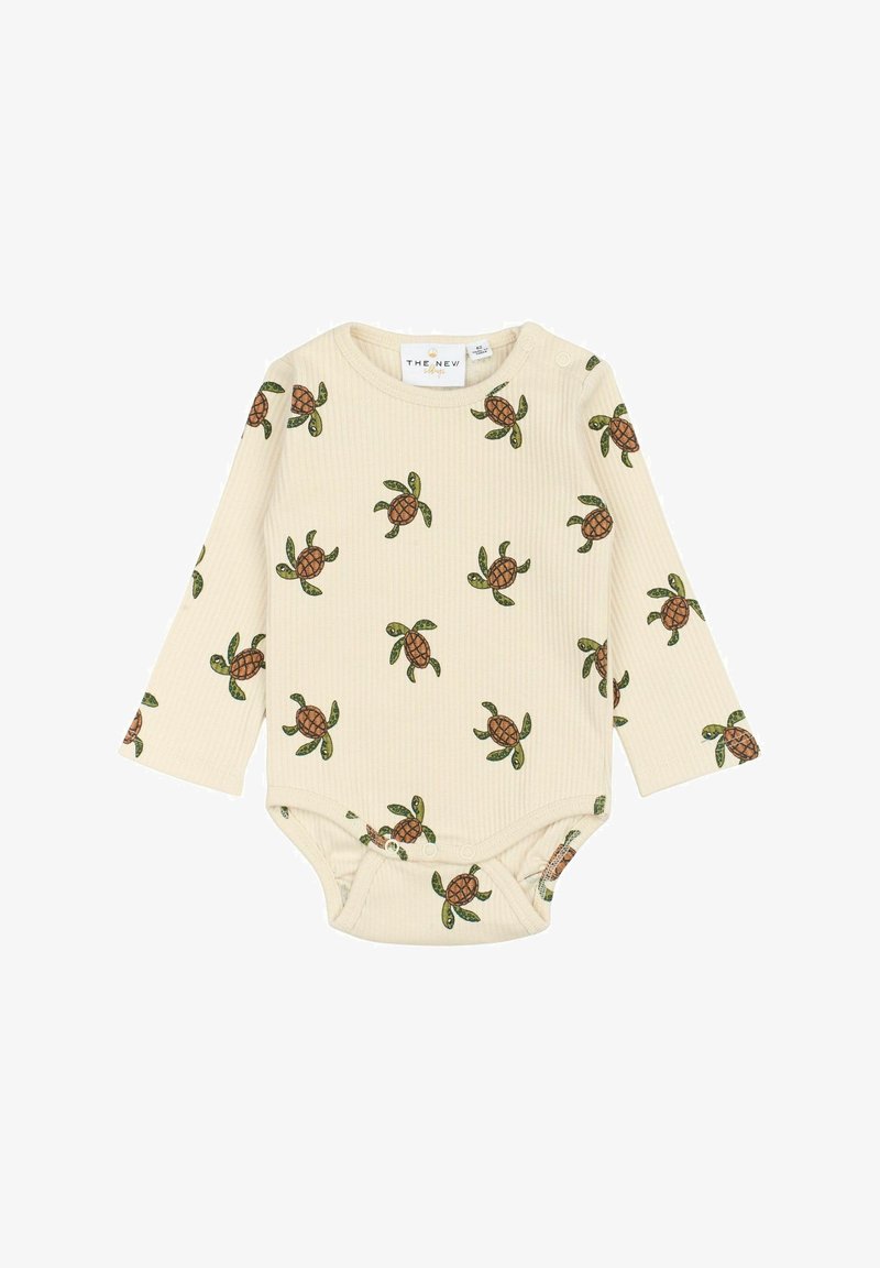 Bodysuit za dojenčke z dolgimi rokavi v svetlo bež rebrasti tkanini, ki prikazuje print želv in listov, z gumbi na dnu za enostavno oblačenje.