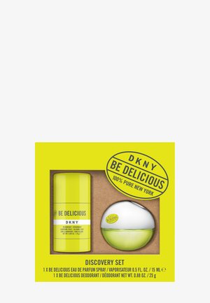 DKNY Be Delicious Discovery-sett med gul deodorantstick og rund sølvgrønn parfymeflaske i en lys gul eske.