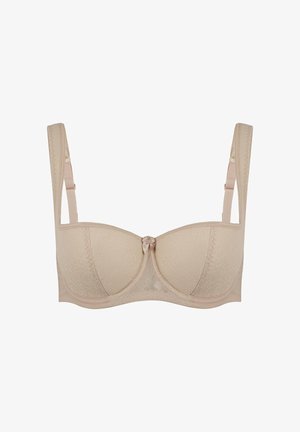 Beige underwire bra with floral lace pattern, soft fabric, curved cups, and adjustable straps. Finished with a decorative bow at the center.