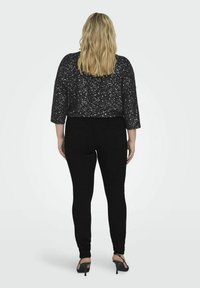 ONLY Carmakoma CARTHUNDER PUSH UP REG SK MBD NP - Jeans Skinny Fit - black