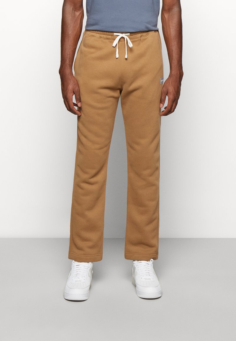 Hollister Co. ELEVATED CHAIN Tracksuit bottoms tan Zalando.ie