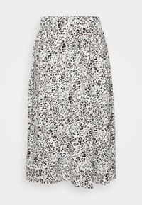 Jupe à taille élastique en tissu léger avec une base blanche ornée d'un motif léopard noir et marron. Design fluide et longueur au genou.