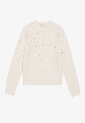 Crème lange mouw trui met ronde hals, versierd met verspreide kleine zilveren en parel bestaan op de voorkant en mouwen.