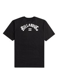 Černé bavlněné tričko s výrazným bílým logem "BILLABONG" zakřiveným nad designem vlny na zadní straně. Krátké rukávy a kulatý výstřih.