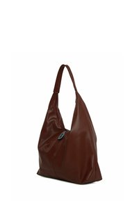 Hnedá kožená hobo taška s jedným ramenným popruhom, mäkkou textúrou, uvoľneným dizajnom a modrým zipsom ako akcentom.