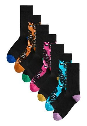 Six pairs of black crew socks with colorful toes and monster face patterns in blue, orange, pink, and purple accents.