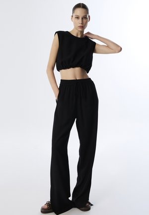 Tracksuit bottoms - black
