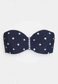 Navy blå bandeau bikini topp med hvite prikkete, med samlet stoff i midten og dekorative stropper. Glatt tekstur.