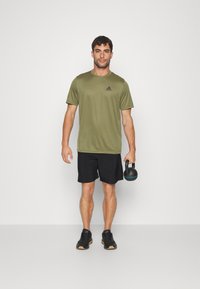 Under Armour GRAPHIC  - Spordišortsid - black/white
