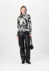 Marimekko JAKALA MARRAS TURTLE NECK - Maglietta a manica lunga - black