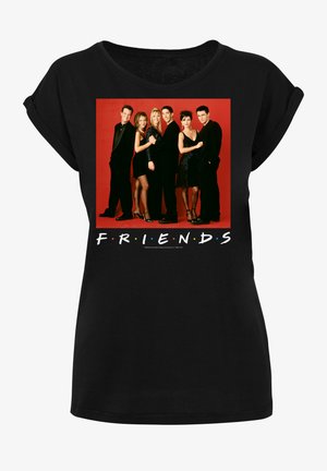 Czarna koszulka z nadrukiem grupowego zdjęcia pięciu osób na czerwonym tle, z napisem "F.R.I.E.N.D.S" poniżej.