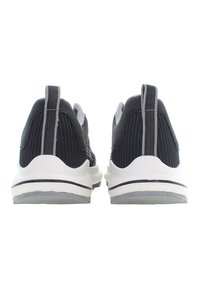 Czarne siateczkowe buty sportowe z białą podeszwą, z teksturowanym wzorem i szarym akcentem na pięcie. Minimalistyczny widok z tyłu.